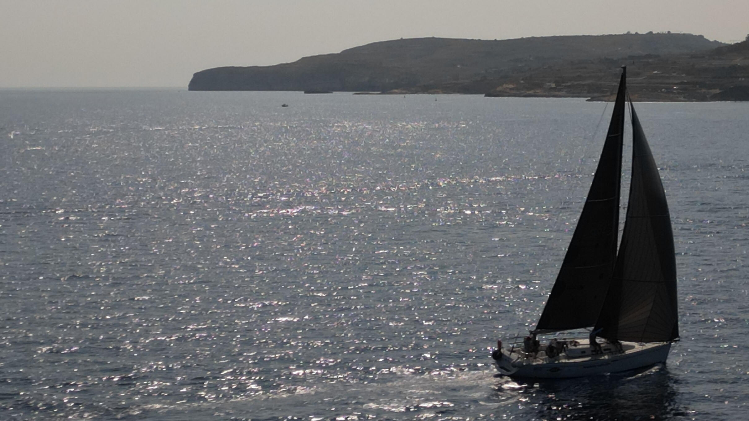 Sailing in North Comino Channel Sailing in North Comino Channel